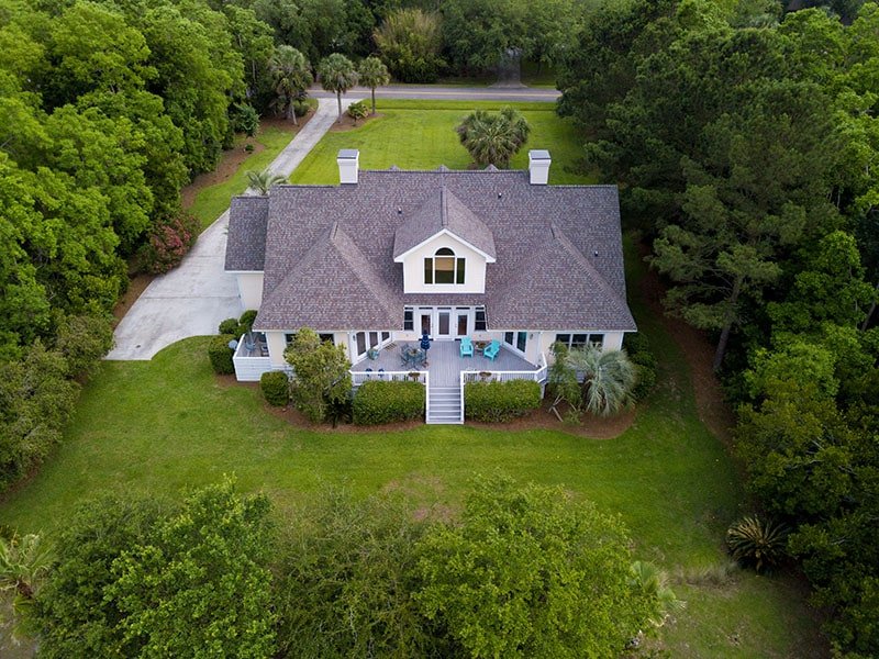 aerial-view-of-large-home-with-new-roof-on-wooded-Property Transfer Tax Exemptions