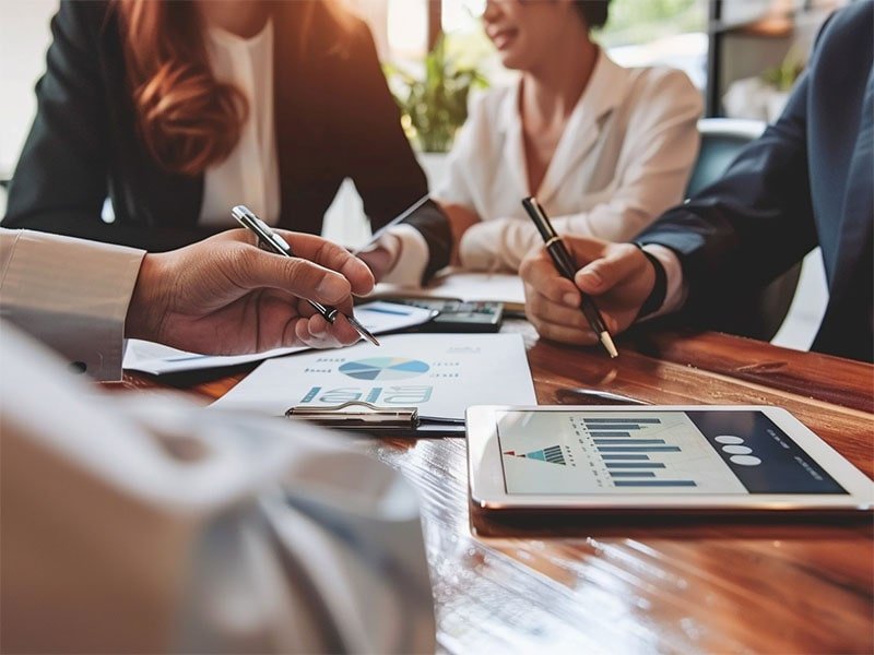 Top realtor discussing home buying options with clients.