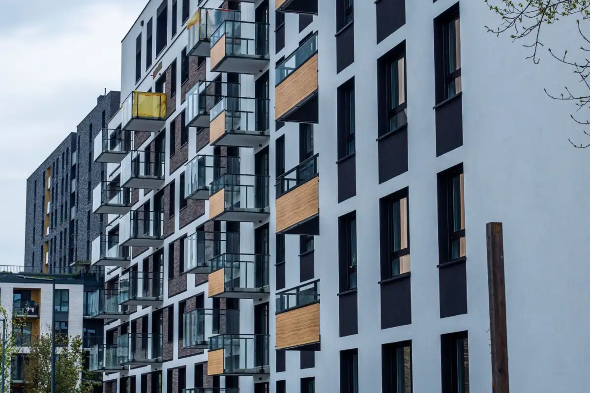 Navid Hakimi Group Best Cities for Real Estate Investors (Rental Yield) in Metro Vancouver 1 Modern apartment building for rental investment