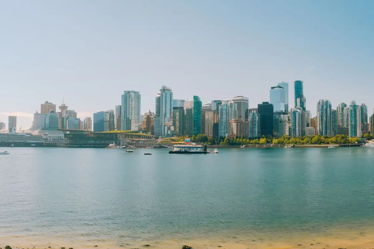 Navid Hakimi Group Vancouver vs Burnaby | Where Should You Buy a Home? 1 Vancouver skyline and waterfront homes