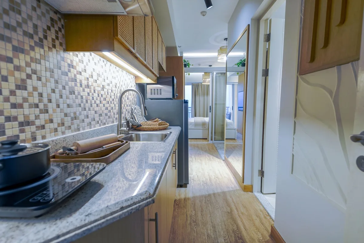 Space-efficient kitchen in a compact condominium