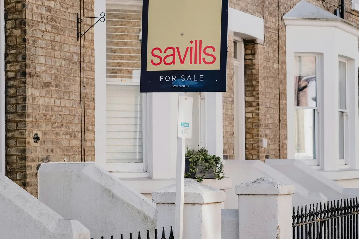 For sale sign outside residential homes
