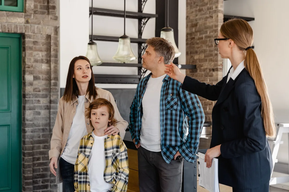 Navid Hakimi Group North Vancouver Home Selling Timeline Explained 3 Real estate agent showing a home to prospective buyers