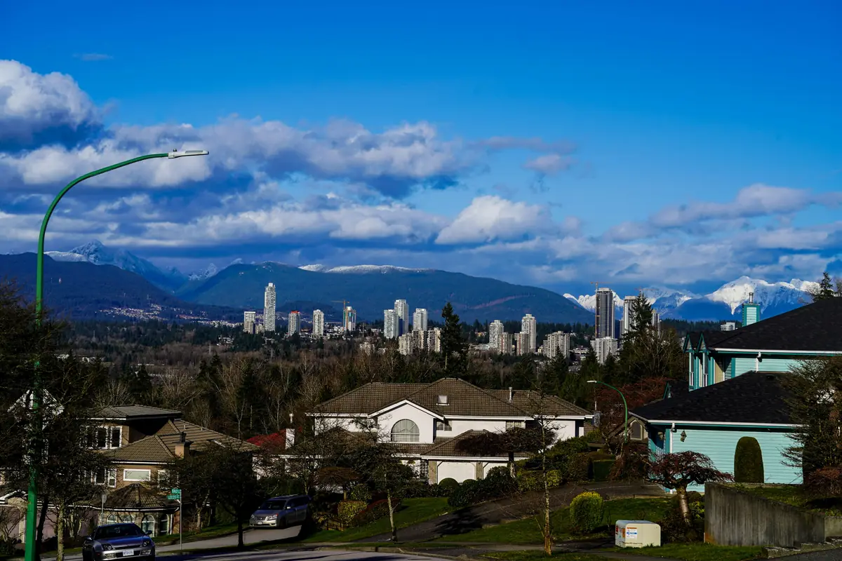 Navid Hakimi Group Speculation and Vacancy Tax in North Vancouver Explained 1 Vancouver homes with the city skyline and mountains