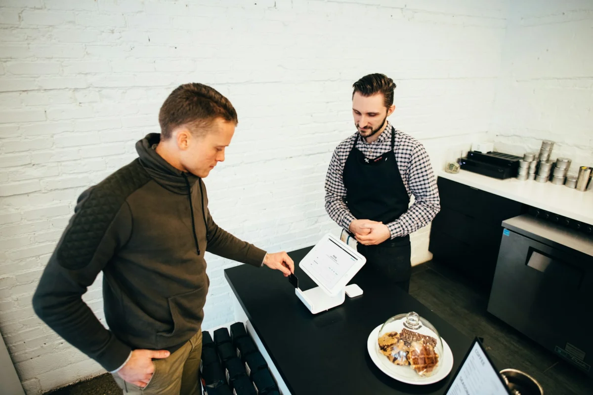 Navid Hakimi Group Does a Mortgage Pre Approval Hurt Your Credit Score in Canada? 1 Mortgage applicant reviewing credit information with an adviser