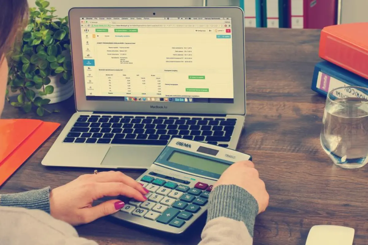 Navid Hakimi Group Home Appraisal vs Home Inspection in BC: Two Different Reports, Two Different Jobs 1 Calculator and financial documents used during a home appraisal