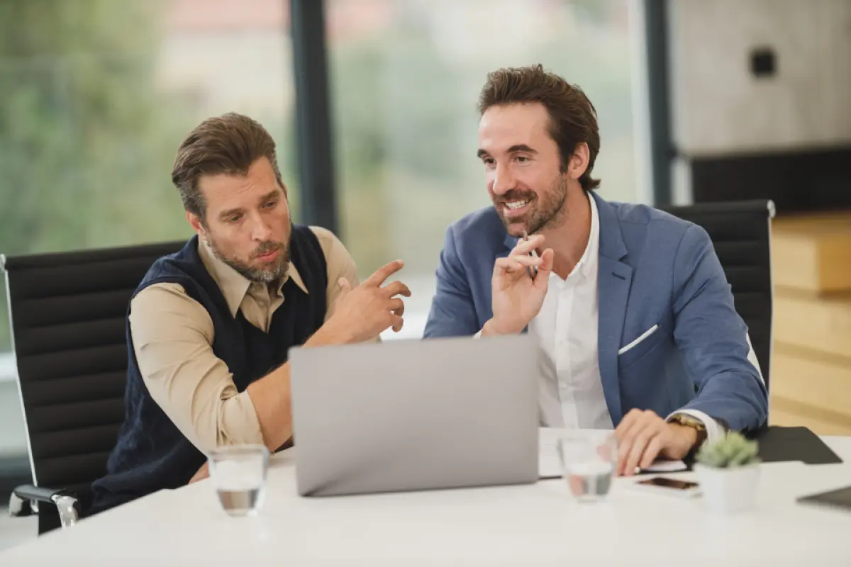 Clients reviewing a real estate proposal during a meeting