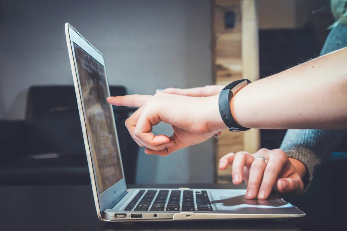 Laptop and documents used for a mortgage qualification review