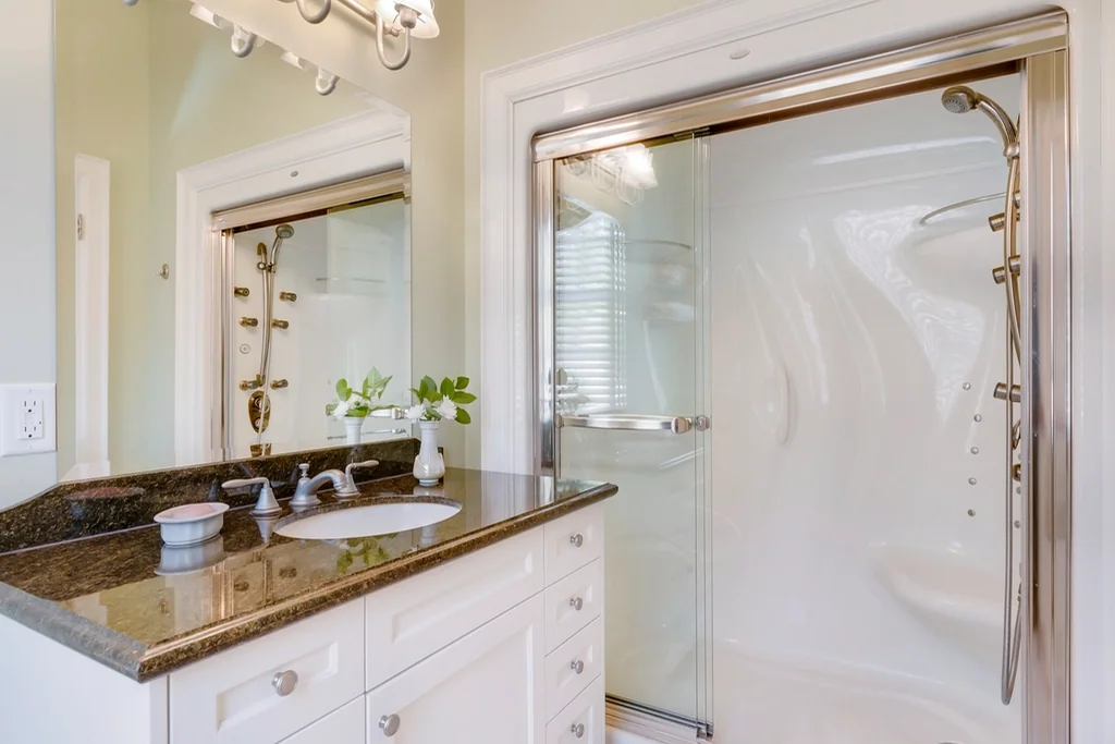 Navid Hakimi Group Presale PDI Checklist: What to Inspect Before You Take Possession in BC 3 New bathroom with a glass shower and vanity to inspect for leaks and finishes