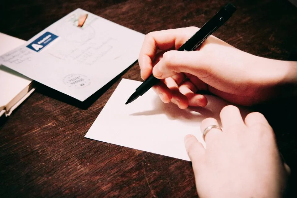 Navid Hakimi Group Home Buyer Rescission Period in BC | The 3-Day Cooling-Off Rule Explained 2 Hand writing a notice next to an envelope
